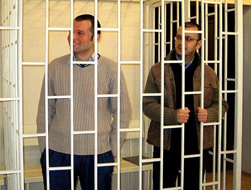 Convicted Emin Milli and Adnan Gadjizade. Photo by www.azadliq.org Convicted Emin Milli and Adnan Gadjizade. Photo by www.azadliq.org