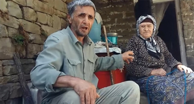 Ramazan Djalaldinov with an old woman in the village of Kenkhi. Screenshot of his video message on YouTube https://www.youtube.com/watch?v=T_oDJXutJJc Ramazan Djalaldinov with an old woman in the village of Kenkhi. Screenshot of his video message on YouTube https://www.youtube.com/watch?v=T_oDJXutJJc
