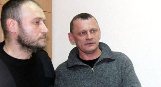 Nikolai Karpyuk (to the left) and Stanislav Klykh in the court. Photo: RFE/RL Nikolai Karpyuk (to the left) and Stanislav Klykh in the court. Photo: RFE/RL