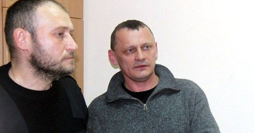 Nikolai Karpyuk (to the left) and Stanislav Klykh in the court. Photo: RFE/RL Nikolai Karpyuk (to the left) and Stanislav Klykh in the court. Photo: RFE/RL