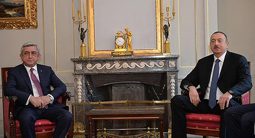 The meeting of Azerbaijani President Ilham Aliev and Armenian President Serzh Sargsyan. Photo: Sputnik Armenia http://sputnikarmenia.ru/armenia/20151219/1439998.html#ixzz48zAklhvx. Twitter/Vladimir Akopyan The meeting of Azerbaijani President Ilham Aliev and Armenian President Serzh Sargsyan. Photo: Sputnik Armenia http://sputnikarmenia.ru/armenia/20151219/1439998.html#ixzz48zAklhvx. Twitter/Vladimir Akopyan
