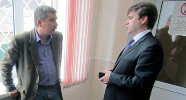 Valery Brinikh (to the left) in the court. Photo: Facebook.com/profile.php?id=100008413898046