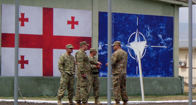 Flags of Georgia and NATO at the Krtsanisi National Training Centre. Photo by Inna Kukudzhanova for the "Caucasian Knot" Flags of Georgia and NATO at the Krtsanisi National Training Centre. Photo by Inna Kukudzhanova for the "Caucasian Knot"
