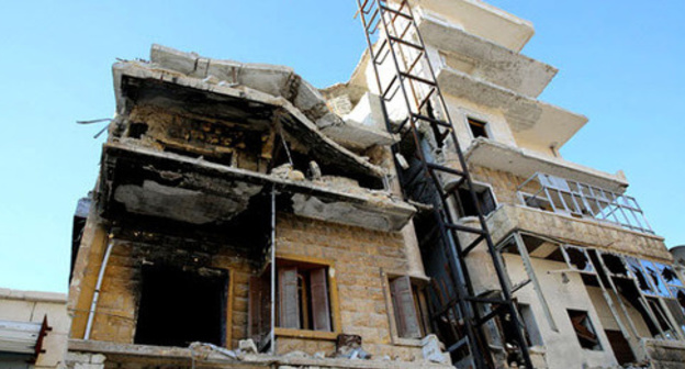 A destroyed building in Aleppo. Syria. Photo by the user IHH Humanitarian Relief Foundation https://www.flickr.com A destroyed building in Aleppo. Syria. Photo by the user IHH Humanitarian Relief Foundation https://www.flickr.com