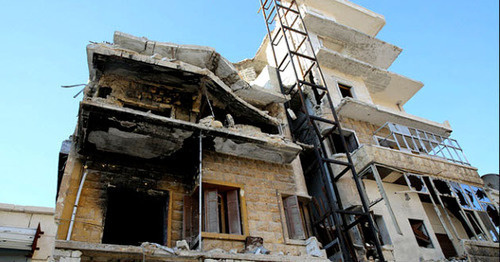 A destroyed building in Aleppo. Syria. Photo by the user IHH Humanitarian Relief Foundation https://www.flickr.com A destroyed building in Aleppo. Syria. Photo by the user IHH Humanitarian Relief Foundation https://www.flickr.com