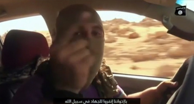 Screenshot of the video calling for jihad against Russia that was posted by "Islamic State" (IS), banned in Russia by the court and recognized as a terrorist organization, st.com/Middle-East/ISIS-Threat/ISIS-Listen-Putin-we-will-come-to-Russia-and-kill-you-at-your-homes-462919 Screenshot of the video calling for jihad against Russia that was posted by "Islamic State" (IS), banned in Russia by the court and recognized as a terrorist organization, st.com/Middle-East/ISIS-Threat/ISIS-Listen-Putin-we-will-come-to-Russia-and-kill-you-at-your-homes-462919