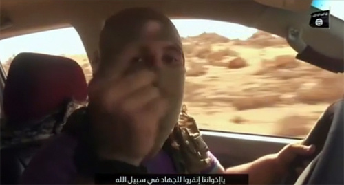 Screenshot of the video calling for jihad against Russia that was posted by "Islamic State" (IS), banned in Russia by the court and recognized as a terrorist organization, st.com/Middle-East/ISIS-Threat/ISIS-Listen-Putin-we-will-come-to-Russia-and-kill-you-at-your-homes-462919 Screenshot of the video calling for jihad against Russia that was posted by "Islamic State" (IS), banned in Russia by the court and recognized as a terrorist organization, st.com/Middle-East/ISIS-Threat/ISIS-Listen-Putin-we-will-come-to-Russia-and-kill-you-at-your-homes-462919