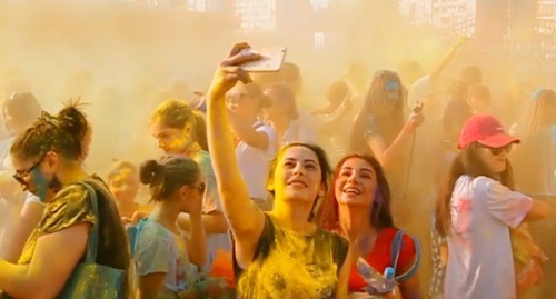Young people take part in festival of colours in Makhachkala, 2015. Screenshot of video record of MDK Dagestan group in VKontakte social network, Vk.com/video-60302983_171564570 Young people take part in festival of colours in Makhachkala, 2015. Screenshot of video record of MDK Dagestan group in VKontakte social network, Vk.com/video-60302983_171564570