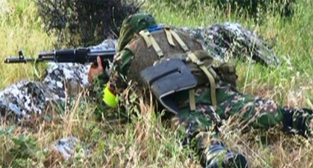 A law enforcer during CTO. Photo: http://nac.gov.ru/fotomaterialy@page=3.html A law enforcer during CTO. Photo: http://nac.gov.ru/fotomaterialy@page=3.html