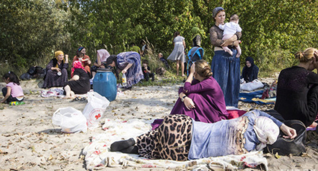 Refugees from Chechnya in a camp near Belarus-Poland border. Photo by Stanislav Korshunov, TUT.BY http://news.tut.by/society/510015.html Refugees from Chechnya in a camp near Belarus-Poland border. Photo by Stanislav Korshunov, TUT.BY http://news.tut.by/society/510015.html