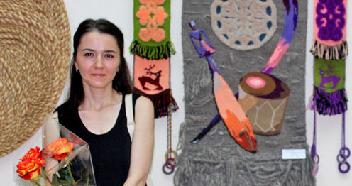 Artist Marian Ismail and her artwork 'Music at midnight', tapestry. Exhibition "Autumn-2016", Nalchik, August 31, 2016. Photo by Lyudmila Maratova for the 'Caucasian Knot'. Artist Marian Ismail and her artwork 'Music at midnight', tapestry. Exhibition "Autumn-2016", Nalchik, August 31, 2016. Photo by Lyudmila Maratova for the 'Caucasian Knot'.
