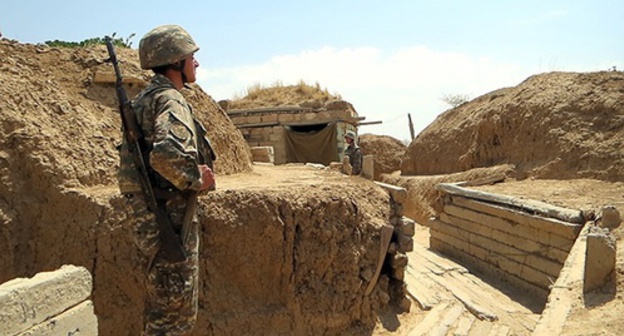 Soldier of Nagorno-Karabakh Army at the front-line. Photo by Alvard Grigoryan for the 'Caucasian Knot'. Soldier of Nagorno-Karabakh Army at the front-line. Photo by Alvard Grigoryan for the 'Caucasian Knot'.