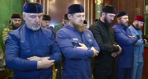 Kadyrov and his confidents pray Namaz. Photo: screenshot of video posted at Kadyrov's page in VKontakte social network, vk.com/ramzan Kadyrov and his confidents pray Namaz. Photo: screenshot of video posted at Kadyrov's page in VKontakte social network, vk.com/ramzan