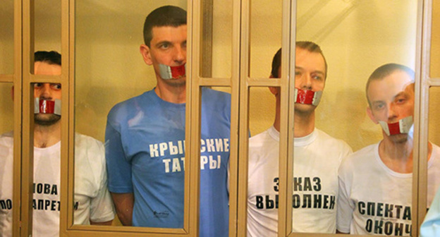 The defendants in the "Hizb ut-Tahrir" case - Ruslan Zeitullaev, Ferat Seifullaev, Rustem Vaitov and Nuri Primov - during the verdict announcement. September 7, 2016. Photo by Konstantin Volgin for the "Caucasian Knot" The defendants in the "Hizb ut-Tahrir" case - Ruslan Zeitullaev, Ferat Seifullaev, Rustem Vaitov and Nuri Primov - during the verdict announcement. September 7, 2016. Photo by Konstantin Volgin for the "Caucasian Knot"