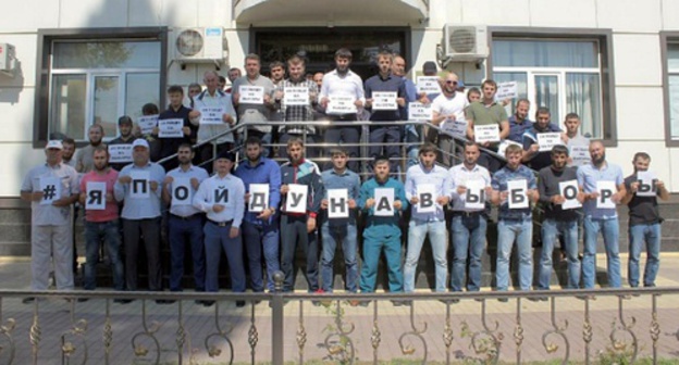 Employees of Chechen communication company 'Vainakh-Telecom' take part in flashmob #I'llgotothepolls, instagram.com/vtk995 Employees of Chechen communication company 'Vainakh-Telecom' take part in flashmob #I'llgotothepolls, instagram.com/vtk995
