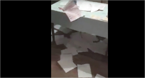 Trampled down ballot papers at the polling station in the village of Gotsatl. Screenshot of a video from the "Dagestan Online" community on Facebook, facebook.com/groups/dagonline Trampled down ballot papers at the polling station in the village of Gotsatl. Screenshot of a video from the "Dagestan Online" community on Facebook, facebook.com/groups/dagonline