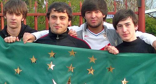 Young people holding a Circassian flag. Photo by the "Caucasian Knot" correspondent Asya Kapaeva Young people holding a Circassian flag. Photo by the "Caucasian Knot" correspondent Asya Kapaeva