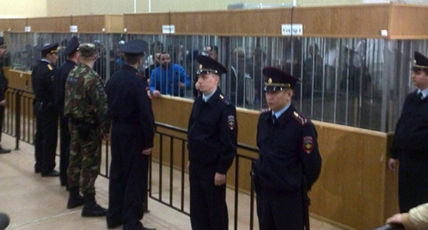 The police in the court room during the session in the case of the attack on Nalchik. Photo: http://memohrc.org/news/vynesen-prigovor-po-delu-o-vooruzhennom-napadenii-na-nalchik The police in the court room during the session in the case of the attack on Nalchik. Photo: http://memohrc.org/news/vynesen-prigovor-po-delu-o-vooruzhennom-napadenii-na-nalchik