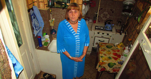 Nadezhda Shakhmardanova says that starting from July, floor in her municipal apartment in Chekhov Street began to go down, while the apartment is permanently flooded by groundwater, Astrakhan, September 2016. Photo by Vyacheslav Yaschenko for the 'Caucasian Knot'. Nadezhda Shakhmardanova says that starting from July, floor in her municipal apartment in Chekhov Street began to go down, while the apartment is permanently flooded by groundwater, Astrakhan, September 2016. Photo by Vyacheslav Yaschenko for the 'Caucasian Knot'.