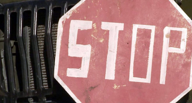 Road sign 'Stop' fixed at Dagestani police car bumper. Photo: http://nac.gov.ru/kontrterroristicheskie-operacii/v-hode-kto-v-dagestane-neytralizovany-troe-0.html Road sign 'Stop' fixed at Dagestani police car bumper. Photo: http://nac.gov.ru/kontrterroristicheskie-operacii/v-hode-kto-v-dagestane-neytralizovany-troe-0.html