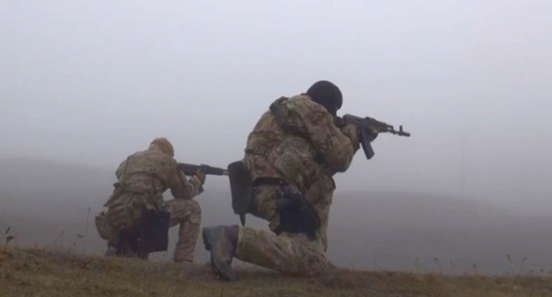 The law enforcers during special operation in the village of Kvanada. Screenshot of a video by NAC, youtube.com/watch?v=__MAWbCnsZA The law enforcers during special operation in the village of Kvanada. Screenshot of a video by NAC, youtube.com/watch?v=__MAWbCnsZA