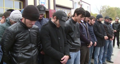 Drivers stand with their heads down while being addressed by Kadyrov. Screenshot of the video record posted on Kadyrov's page in social network vk.com/ramzan Drivers stand with their heads down while being addressed by Kadyrov. Screenshot of the video record posted on Kadyrov's page in social network vk.com/ramzan