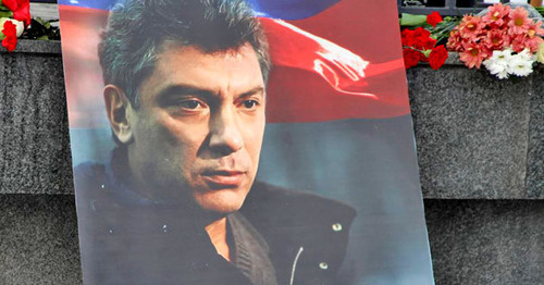 Boris Nemtsov's photo at the site of the murder. Photo: RFE/RL Boris Nemtsov's photo at the site of the murder. Photo: RFE/RL