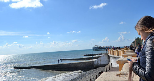 Tourists on the beach in Sochi. Photo by Svetlana Kravchenko for the Tourists on the beach in Sochi. Photo by Svetlana Kravchenko for the