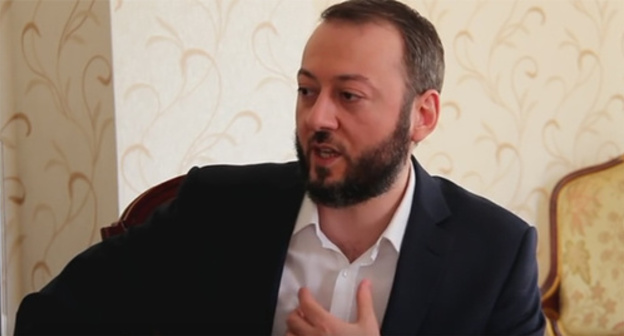 Magomed Khazbiev. Photo: screenshot of a video record of the interview of Magomed Khazbiev, Magas Life News Agency https://www.youtube.com/watch?v=e8ITP9c-8yk Magomed Khazbiev. Photo: screenshot of a video record of the interview of Magomed Khazbiev, Magas Life News Agency https://www.youtube.com/watch?v=e8ITP9c-8yk