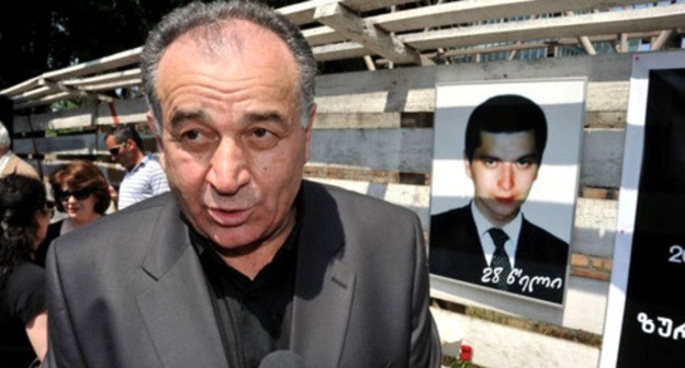 David Vazagashvili near the portrait of his son Zurab Vazagashvili. Photo: RFE/RL David Vazagashvili near the portrait of his son Zurab Vazagashvili. Photo: RFE/RL