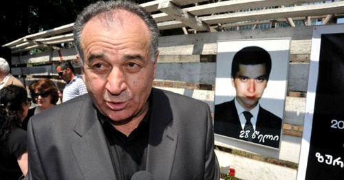 David Vazagashvili near the portrait of his son Zurab Vazagashvili. Photo: RFE/RL David Vazagashvili near the portrait of his son Zurab Vazagashvili. Photo: RFE/RL