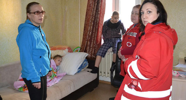 The Dyakov family and ambulance doctors. Photo by Svetlana Kravchenko for the 'Caucasian Knot'. The Dyakov family and ambulance doctors. Photo by Svetlana Kravchenko for the 'Caucasian Knot'.