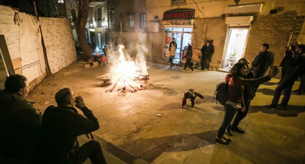 Festive fire during the celebration of Nowruz-Bayram in Baku. Photo by Aziz Karimov for "Caucasian Knot" Festive fire during the celebration of Nowruz-Bayram in Baku. Photo by Aziz Karimov for "Caucasian Knot"