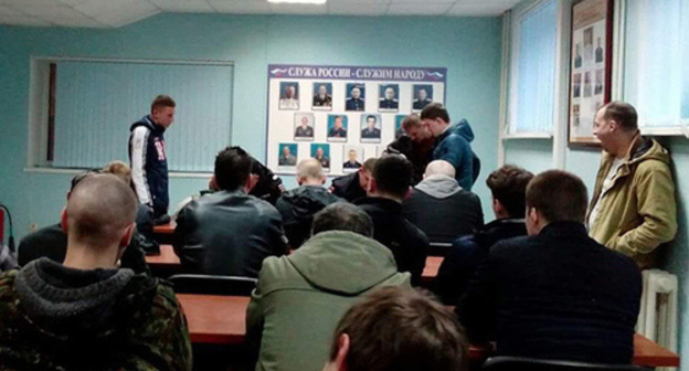 Detainees at police station in Oktyabrskaya Street. Photo by eyewitness provided by Krasnodar headquarters of Alexei Navalny. Detainees at police station in Oktyabrskaya Street. Photo by eyewitness provided by Krasnodar headquarters of Alexei Navalny.