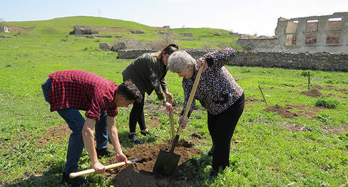 Plating of trees in the village of Mekhakavan in the south of Hadrut District in memory of victims of April war, Nagorny Karabakh, April 8, 2017. Photo by Alvard Grigoryan for the 'Caucasian Knot'. Plating of trees in the village of Mekhakavan in the south of Hadrut District in memory of victims of April war, Nagorny Karabakh, April 8, 2017. Photo by Alvard Grigoryan for the 'Caucasian Knot'.