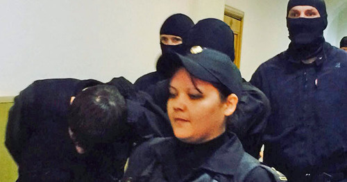 Zaur Dadaev, a defendant in the Boris Nemtsov's murder case, is convoyed through the corridor of the Basmanny Court. Moscow, March 8, 2015. Photo by Yuliya Buslavskaya for "Caucasian Knot" Zaur Dadaev, a defendant in the Boris Nemtsov's murder case, is convoyed through the corridor of the Basmanny Court. Moscow, March 8, 2015. Photo by Yuliya Buslavskaya for "Caucasian Knot"