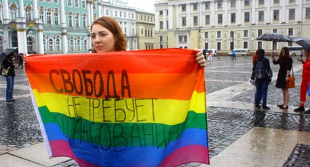 A participant of the rally of the LGBT activists. St. Petersburg, July 2016. Photo: RFE/RL A participant of the rally of the LGBT activists. St. Petersburg, July 2016. Photo: RFE/RL
