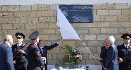 An opening of the commemorative plaque in honour of Magomed Nurbagandov, a staff member of the Dagestani Ministry of Internal Affairs (MIA). Photo http://www.riadagestan.ru An opening of the commemorative plaque in honour of Magomed Nurbagandov, a staff member of the Dagestani Ministry of Internal Affairs (MIA). Photo http://www.riadagestan.ru