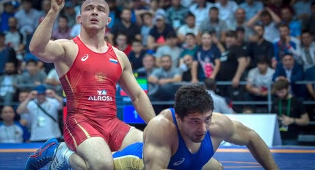 Vladislav Valiev and Shamil Kudiyamagomedov's fight at the Russian championship in Ingushetia. Photo by the Russian Wrestling Federation https://vk.com/wrestrus_ru?z=photo-26619469_456242140%2Fwall-26619469_338300 Vladislav Valiev and Shamil Kudiyamagomedov's fight at the Russian championship in Ingushetia. Photo by the Russian Wrestling Federation https://vk.com/wrestrus_ru?z=photo-26619469_456242140%2Fwall-26619469_338300