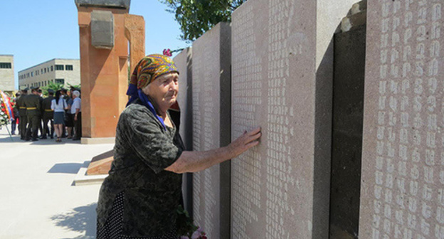 Shushan Ayrapetyan near the memorial with the carved names of people missed in the Karabakh war, including her own son. The Stepanakert Memorial Complex, Nagorno-Karabakh, June 29, 2017. Photo by Alvard Grigoryan for "Caucasian Knot" Shushan Ayrapetyan near the memorial with the carved names of people missed in the Karabakh war, including her own son. The Stepanakert Memorial Complex, Nagorno-Karabakh, June 29, 2017. Photo by Alvard Grigoryan for "Caucasian Knot"