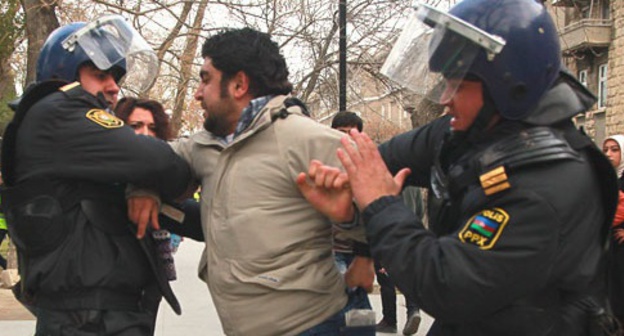 Detention of a protester at the rally in support of the Ismayilli residents. Baku, January 26, 2013. Photo by Aziz Karimov for "Caucasian Knot" Detention of a protester at the rally in support of the Ismayilli residents. Baku, January 26, 2013. Photo by Aziz Karimov for "Caucasian Knot"
