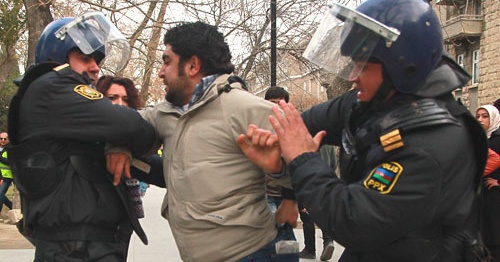 Detention of a protester at the rally in support of the Ismayilli residents. Baku, January 26, 2013. Photo by Aziz Karimov for "Caucasian Knot" Detention of a protester at the rally in support of the Ismayilli residents. Baku, January 26, 2013. Photo by Aziz Karimov for "Caucasian Knot"