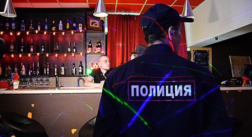 Policeman in a bar. Photo by Maria Mayer, IA 'Komiinform' Policeman in a bar. Photo by Maria Mayer, IA 'Komiinform'