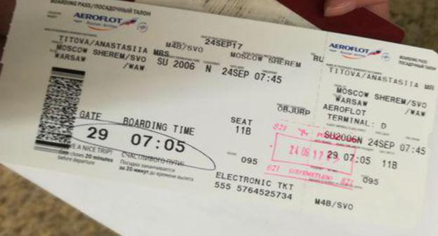 Anastasia Titova 's boarding pass for Moscow-Warsaw flight. Photo is provided by Anastasia Titova. Anastasia Titova 's boarding pass for Moscow-Warsaw flight. Photo is provided by Anastasia Titova.