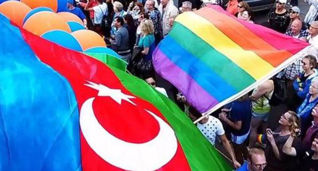 Flag of Azerbaijan and Rainbow flag at rally in Hamburg. Photo: Nefes LGBT Azerbaijan Alliance Flag of Azerbaijan and Rainbow flag at rally in Hamburg. Photo: Nefes LGBT Azerbaijan Alliance