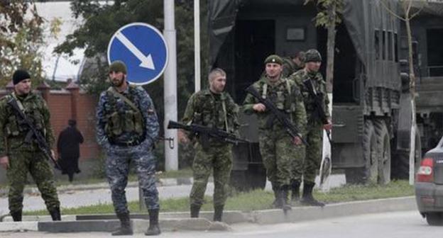Law enforcers. Grozny, Chechnya. Photo: REUTERS/Alkhan Gargayev Law enforcers. Grozny, Chechnya. Photo: REUTERS/Alkhan Gargayev