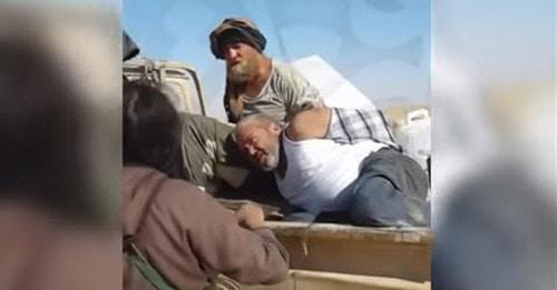 Still picture from the video showing captivity of the Cossack Roman Zabolotniy in Syria: https://www.youtube.com/watch?v=2QkDaZNGxsY Still picture from the video showing captivity of the Cossack Roman Zabolotniy in Syria: https://www.youtube.com/watch?v=2QkDaZNGxsY
