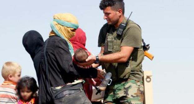 Woman with children, Iraq. Photo: REUTERS/Ako Rasheed Woman with children, Iraq. Photo: REUTERS/Ako Rasheed