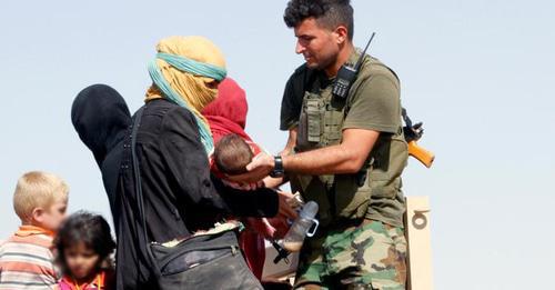 Woman with children, Iraq. Photo: REUTERS/Ako Rasheed Woman with children, Iraq. Photo: REUTERS/Ako Rasheed