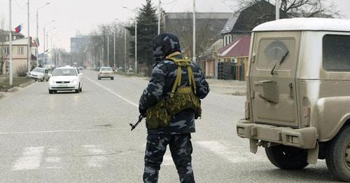 A law enforcer. Photo: REUTERS/MAXIM SHEMETOV A law enforcer. Photo: REUTERS/MAXIM SHEMETOV